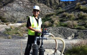 Dennis Hayashi inspecting newly installed landfill gas equipment.